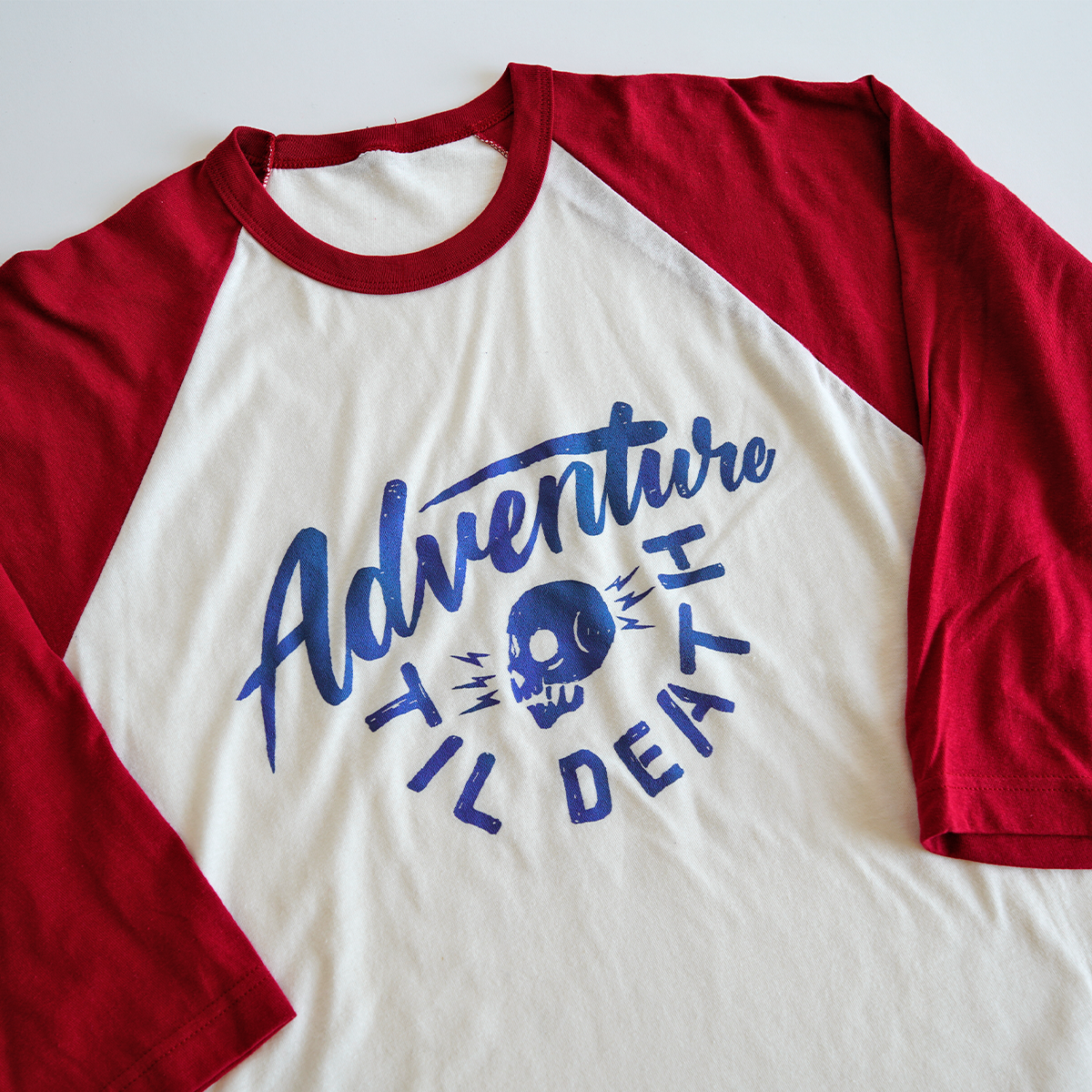 ADVENTURE TIL DEATH - RAGLAN TEE - VINTAGE WHTIE RIO RED