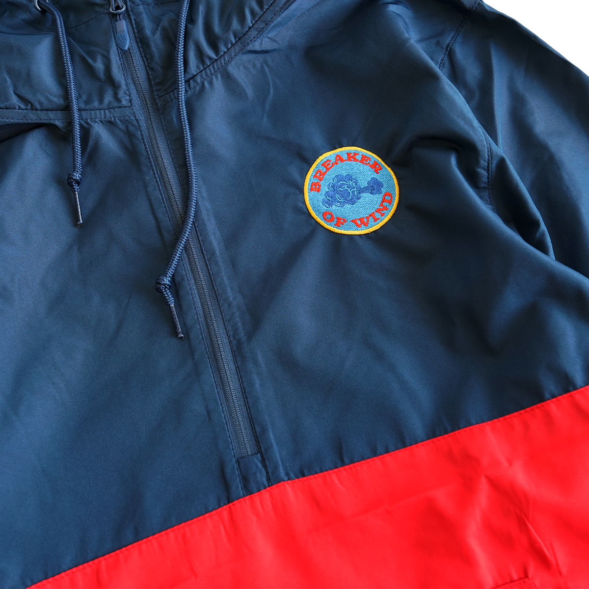 BREAKER OF WIND - WINDBREAKER - RED/NAVY